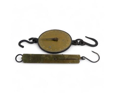 A set of late 19th century Salter balance scales - iron hooks and fittings with a circular brass scale to 100 pounds in half 