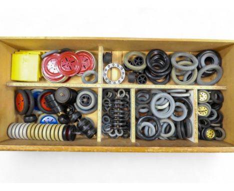 Meccano - Wheels/Tyres etc  Large wooden compartmentalised drawer containing a quantity of Meccano tyres, wheels, bearings et