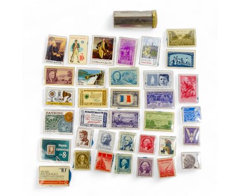 A small quantity of American stamps 1932-1985 - together with a Magic Pocket Savings Bank.