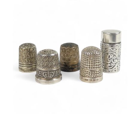 A Charles Horner silver thimble - together with three other silver thimbles and a small silver cylinder with lid, total weigh