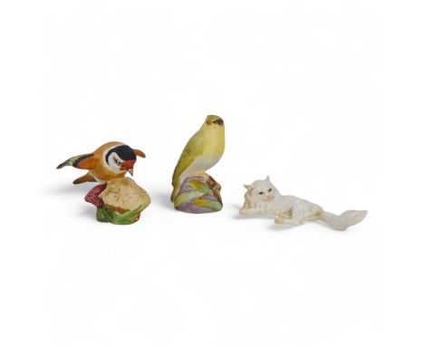 A Royal Worcester model of a Goldfinch - alighting on a thistle with wings outstretched, 8cm wide, together with another simi