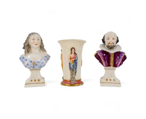 An early 20th century German porcelain bust of Shakespeare - wearing a puce jacket and raised on a square base, 14cm high, to