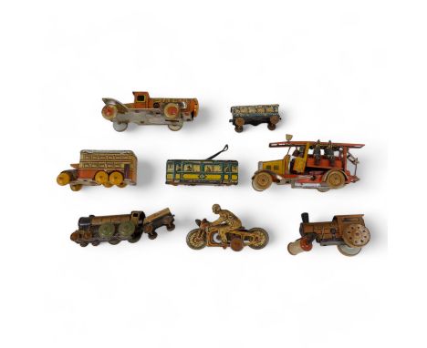 A small quantity of early 20th century German tin plate clockwork toys - with lithographic decoration, vehicles include a fir