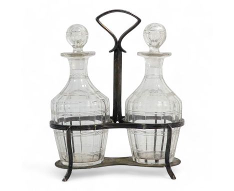 An early 20th century silver plated oil and vinegar cruet - Asprey, with a pair of clear faceted glass bottles, 22cm high.