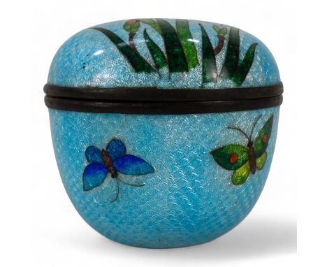 A Japanese Ginbari cloisonne pot and cover - of circular form and decorated with irises on a light blue ground, 8cm diameter.