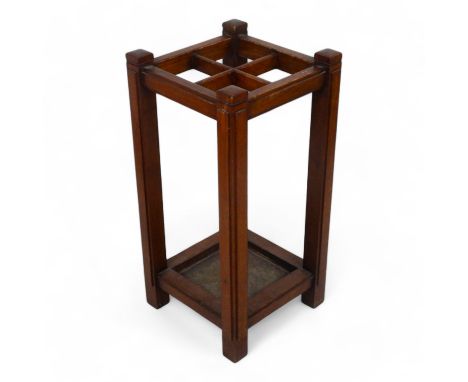 An early 20th century walnut stick stand - in an Art Deco style, square with four divisions 31 x 31 x 64cm.