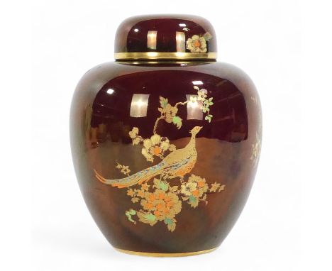 A mid 20th century Carltonware ginger jar - decorated with birds and foliage on an iridescent red ground, 16cm high.