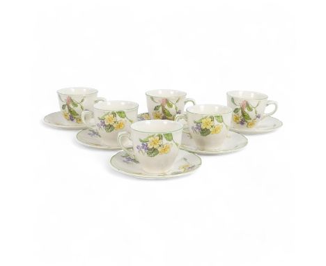 A Royal Doulton tea service - April pattern, comprising six cups and saucers.