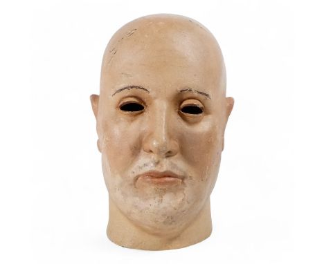 An early 20th century mannequin head - with open eyes and emblazoned 'Shakespeare' to the rear, 27cm high.