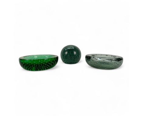 A 20th century green bubble glass paperweight - in the manner of Whitefriars, 8cm diameter, together with two similar bubble 