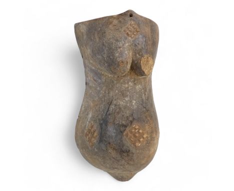 A tribal African fertility carving - the female figure with engorged belly, 36cm high.