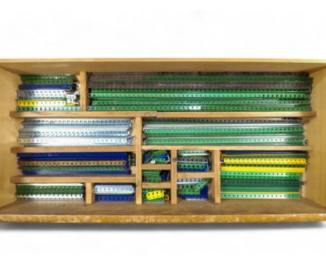 Meccano - Flat and Bracket Straights, Angle Girders, etc.  Two large and one smaller wooden compartmentalised drawers contain