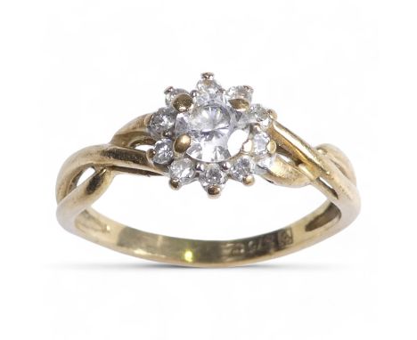 A 9ct gold ring - floral set with cubic zirconia, size K, 1.6g.