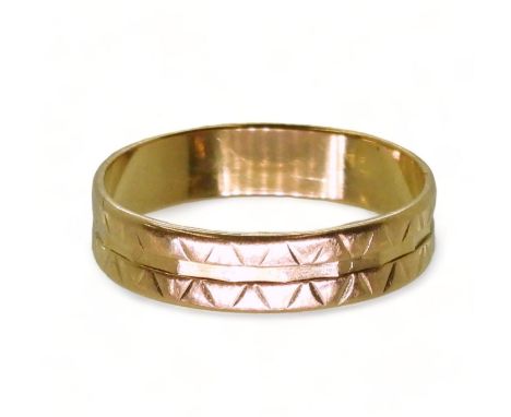 A bright yellow metal wedding ring, finger size R, weight 3.3gms Condition Report:Available upon request