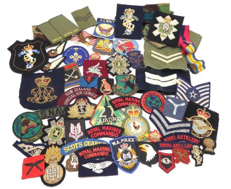 Assorted military cloth patches, with a number of bullion-embroidered examples, including the Royal Highland Fusiliers, Royal