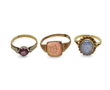 A 9ct gold and platinum garnet ring, size J, an opal doublet (af) ring size J, and a signet ring (af) weight all together 6.3