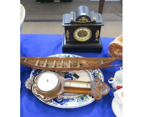 A slate mantle clock with ormolu mounts, a wooden barometer, a ceramic platter and a wooden model of a boat Condition Report: