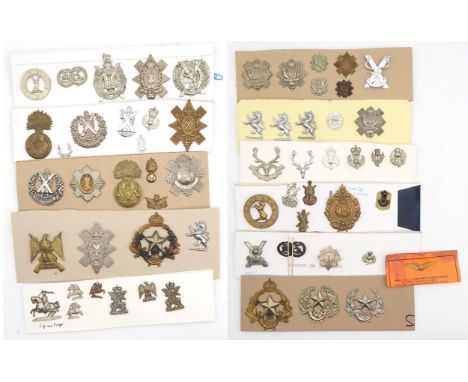 A large collection of military cap and other badges, to include the Lovat Scouts, Fife and Forfar Yeomanry, Cameron Highlande
