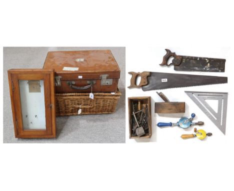 A small assortment of vintage tools, comprising tenon saws, a woodworking plane, two hand-crank drills with a quantity of bit