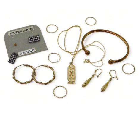 A collection of 9ct gold&nbsp; and yellow metal items to include a bangle, and 9ct Egyptian pendant and chain, earrings etc, 