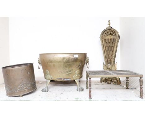A lot comprising brass "peacock" fire screen, brass coal bucket with lion masque handles on paw feet, smaller brass bucket an