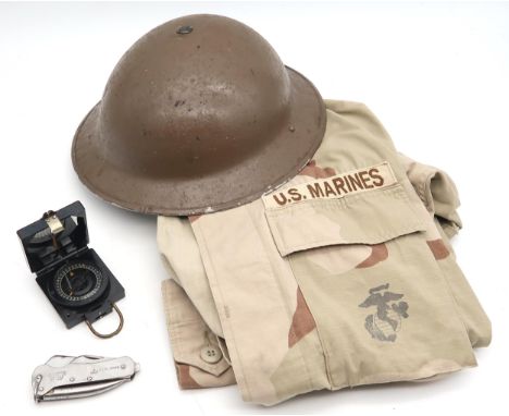 A WW2 British Brodie helmet, stamped "1941 EC &amp; Co Ltd" to underside of brim, 1953-dated military-issue pocket knife by J