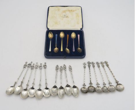 A cased set of harlequin guilloche enamel silver spoons, marked 925, a set of Dutch silver spoons, the finials modelled as bi