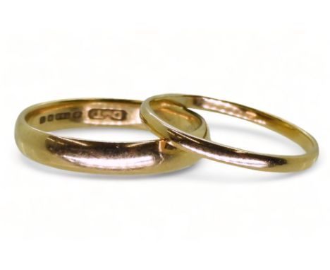 Two 18ct gold wedding rings, sizes, S1/2 (wider) and R, weight together 5.2gms Condition Report:Available upon request