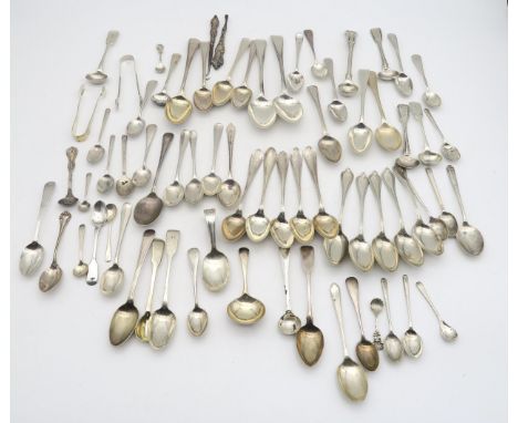 A collection of Georgian and later silver flatware, including tea spoons by Richard Crossley, London, a silver caddy spoon by
