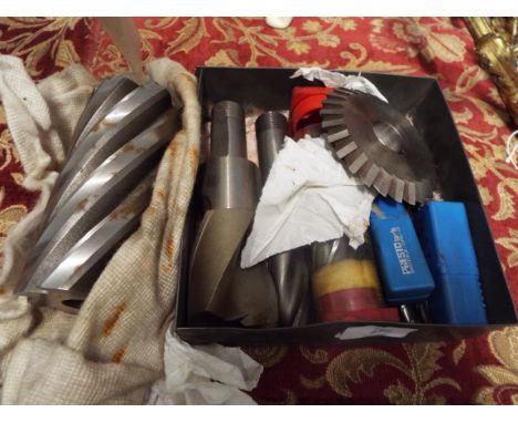 A selection of assorted roller cutters and milling cutters