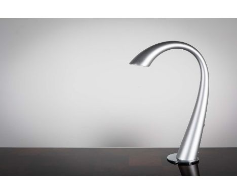 A brushed steel arched lamp, on circular chrome base, 50cm(h)