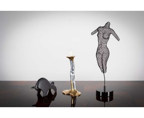 A ceramic model of a bull,  signed with initial F.K 17.5cms wide and a mesh mannequin and gilt metal candlestick (3)
