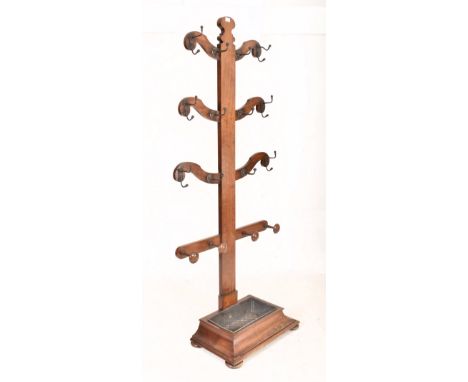 A 19th century Victorian mahogany hall tree / skelton coat stand of upright slender form. The tree having six curved branches