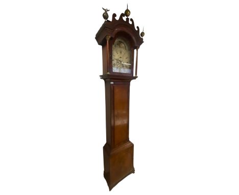 A late 18th century George III mahogany cased longcase grandfather clock. The clock having finials to the hood over a silvere