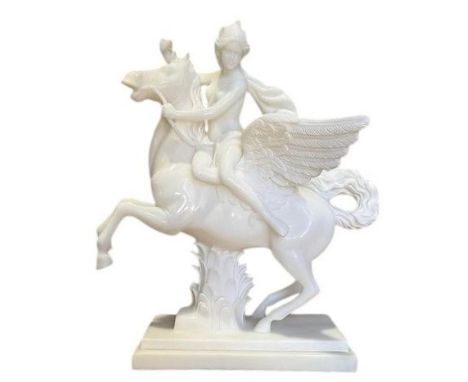 A contemporary 21st-century carved polished solid white marble mythological inspired sculpture of Pegasus and female rider. T