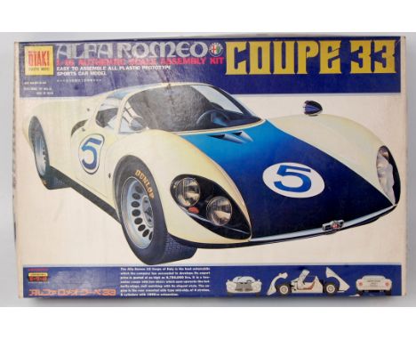 Otaki of Japan, 1/16th scale plastic kit for a Alfa Romeo Coupe 33, appears as issued in the original illustrated box