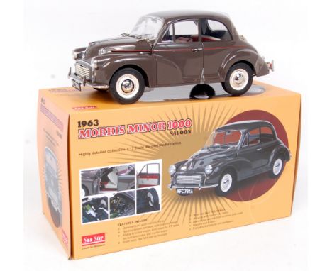 Sun Star 1/12th scale diecast model of a 1963 Morris Minor 1000 Saloon, finished in grey-brown with red and white interior, N