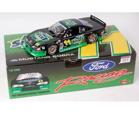 GMP Diecast Model of a 1/18th scale Mustang 1997 Corbra TRANS AM champion race car, finished in green and black with RN 11, i