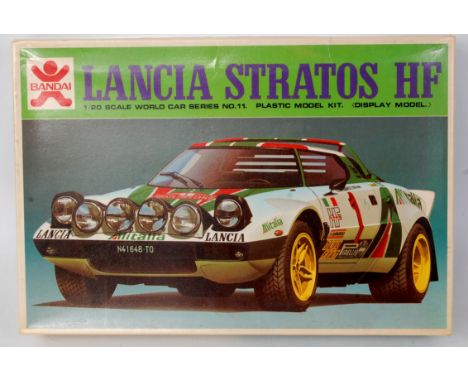 Bandai 1/20th scale plastic model kit for a Lancia Stratos HF, un-made example, some small parts away from sprue, in the orig