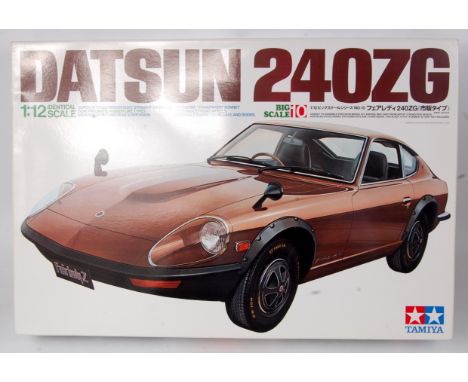 Tamiya 1/12th scale plastic kit for a Datsun 240ZG, in the original box, appears as issued with leaflets and instructions, 