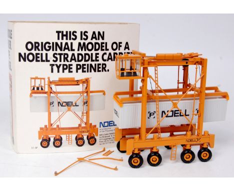 Noell 1/87th scale diecast model of a Noell Straddle Container Carrier, finished in orange with Noell livery, with Noell whit