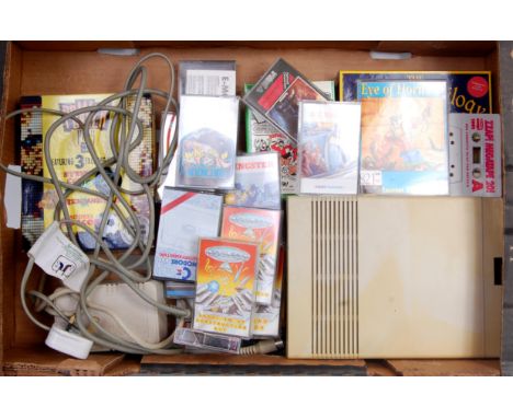 A boxed Commodore 64C, with a quantity of games to include Tool Box Blaze Out, Army Days and others, also sold with the Commo