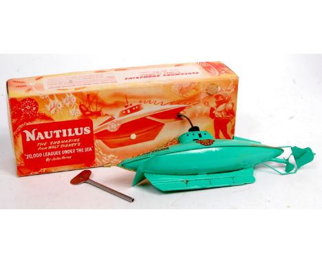 Sutcliffe Models, Nautilus Submarine, clockwork, light green body with gold detailing, with original bung and key, in the ori