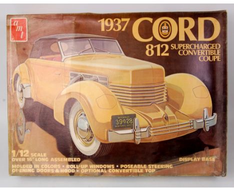 AMT 1/16th scale plastic kit for a 1937 Cord 812 Supercharged Convertible Coupe, in the original box, appears as issued, some