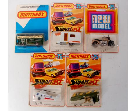 Matchbox Superfast carded diecast group, 5 examples, all sealed to backing cards, to include No.75 Helicopter, No.30 Swamp Ra