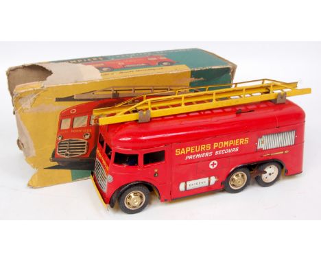 Joustra (France) large tinplate clockwork fire engine, 6 wheeled clockwork model in red, with fixed permanent key, 2 firemen 
