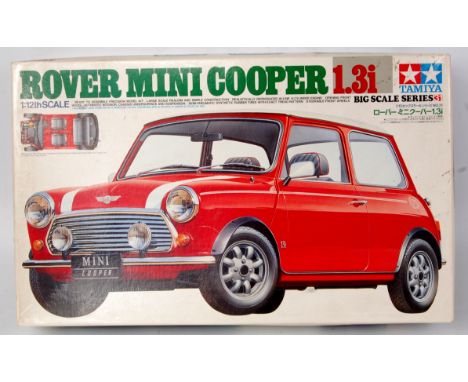 Tamiya 1/12th scale plastic kit for a Rover Mini Cooper 1.3i, appears as issued in the original illustrated lid all card box,