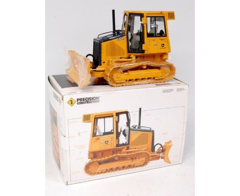 ERTL 1/16th scale diecast model of a John Deere Model 650H dozer, finished in yellow with John Deere Livery, in the original 