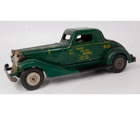 Marx Toys (USA) siren Police Patrol Car, large scale pressed steel friction drive example, fitted with motor, siren and wired