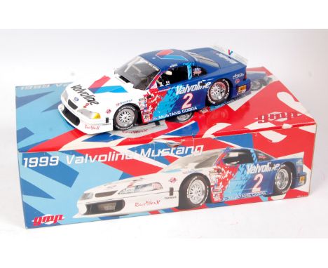 GMP Diecast Model of a 1/18th scale Mustang 1999 Valvoline Trans AM race Car, finished in white, red and blue with RN2, in ht